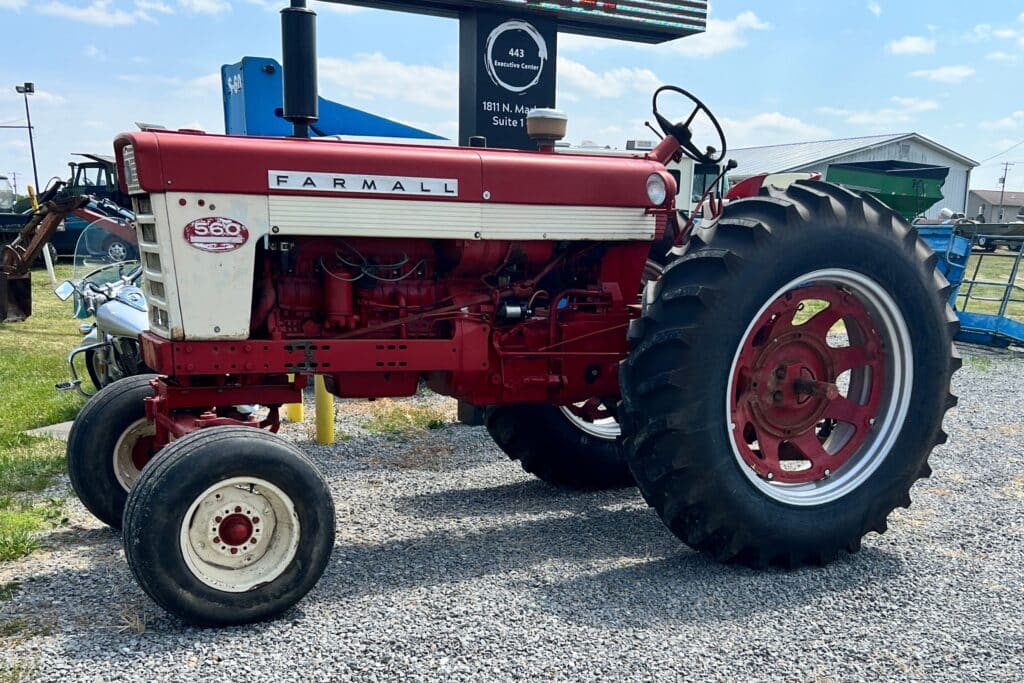 Farmall A Tractor, converted to 12V, engine seized, new front tire rubber,  back tires cracked, one is flat, comes with Woods 59 mower and snow plow -  Albrecht Auction Service